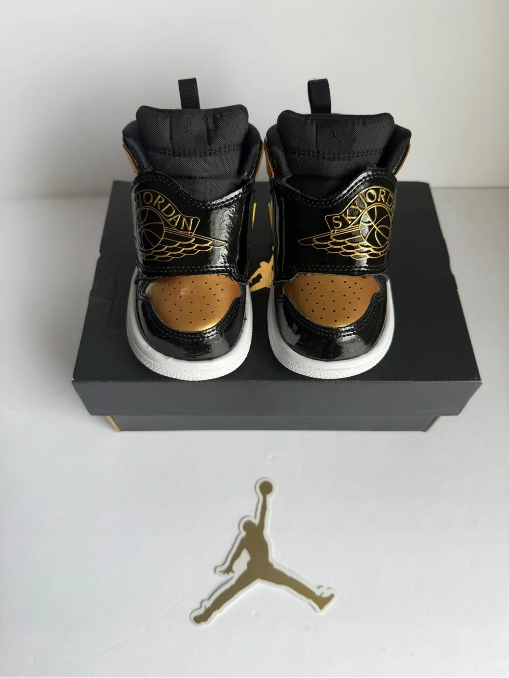 Jordan Baby High-Top Sneakers in Black and Gold